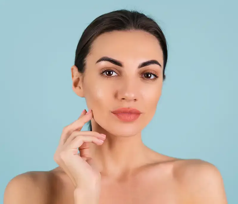 A client's radiant skin after a HydraFacial treatment.
